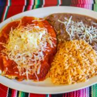 Huevos Rancheros · Handmade corn tortilla with egg, salsa ranchera, and cheese on top. Served with rice, beans,...