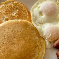 Early Bird 2 · Two eggs with pancakes and your choice of bacon or sausage.