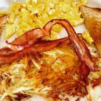 Early Bird 1 · Two eggs with hash browns, toast and your choice of bacon or sausage.
