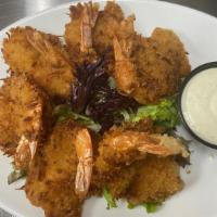 Butterfly Coconut Shrimp · Breaded butterfly shrimp peeled and deveined, hand breaded white shrimp with a unsweetened s...