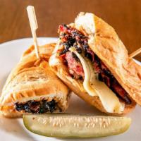 Hot Pastrami Sandwich · Signature 3n1 pastrami rub served on an eight