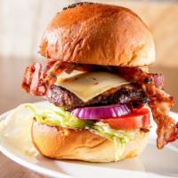 Fireball Burger  · Cajun spiced Angus prime beef patty topped with chili-spiced bacon and pepper jack cheese, l...