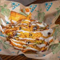 Loaded Not'Chos (Single) · Melted cheddar cheese, jalapenos, onion, black olives and hot sauce on a bed of Nacho Cheese...