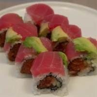 Tuna Delight Roll · Inside with spicy tuna and cucumber. Outside with tuna and avocado.