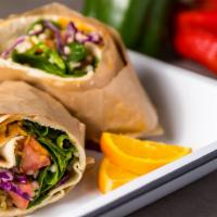 Veggie Pita · Choose from our house made hummus or tzatziki sauce then add 7 of your favorite toppings.