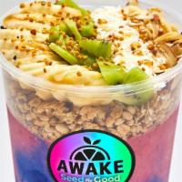 Flamingo Bowl · Pitaya plus, banana, strawberry, pineapple, almond milk blue spirulina. Top: banana, granola...
