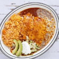 Enchiladas · 2 pieces. Served with rice and beans.