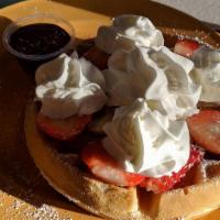 Belgium Waffle · One waffle, whipped cream, fresh strawberries and syrup.