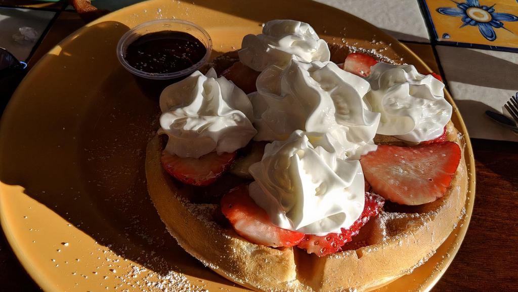 Belgium Waffle · One waffle, whipped cream, fresh strawberries and syrup.