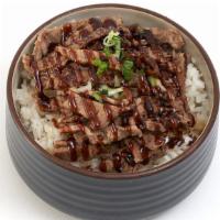 Beef Teriyaki Bowl · Marinated sliced steak, grilled to order and served with our. signature sauce on a bed of ri...