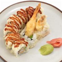 Crunch Roll · Shrimp Tempura, Crabmeat & Avocado Inside with tempura crunch. on top.