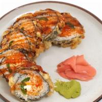 Firecracker Roll · Pepper tuna, cucumber and seaweed salad, topped with spicy mayo and eel sauce.