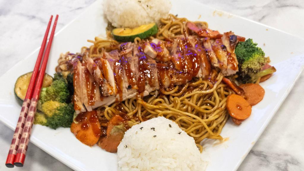Chicken Yakisoba · Japanese noodles wok-stirred with fresh veggies. and traditional yakisoba sauce. Served with teriyaki. chicken & a side of rice.