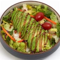 Avocado Salad · Large garden salad topped with sliced avocado &. drizzled with Unagi sauce.