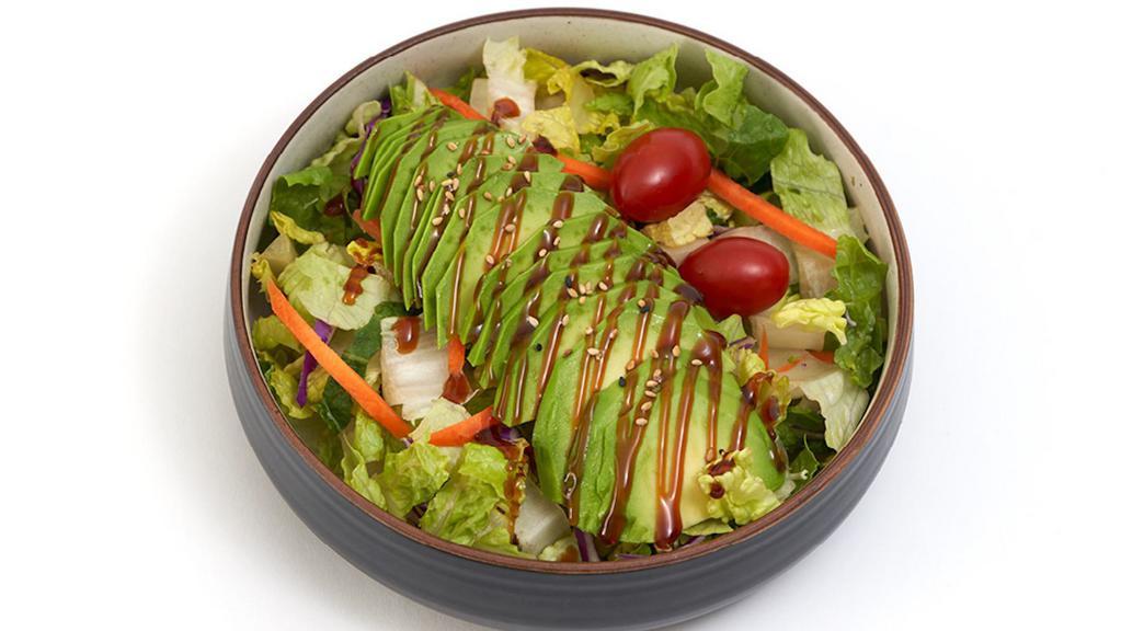 Avocado Salad · Large garden salad topped with sliced avocado &. drizzled with Unagi sauce.