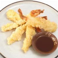 Shrimp Tempura (5 Pcs) · Large shrimp tempura, battered and deep-fried. with a light & crispy coating.