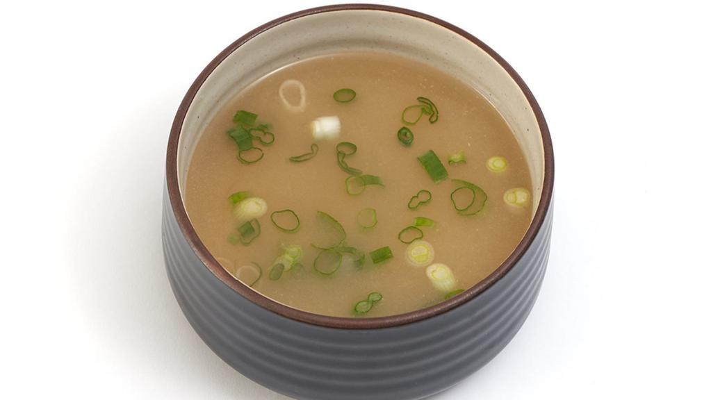 Miso Soup · Traditional Japanese broth with seaweed and green onions.
