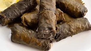 Roll Me A Dolma · 6 grape leaves dumplings with rice, chopped tomatoes, parsley, green onions,lemon juice and ...