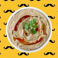 Baba Ghanoush · Vegetable dip made with smoked eggplant.