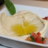 Hummus Heavenly  · Fresh boiled chickpeas ground to a creamy paste, seasoned with  lemon juice ground garlic an...
