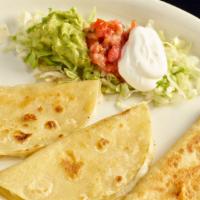 Corn Quesadilla Gf · Three corn tortillas filled with cheese and grilled until flaky. Available in gluten free. A...