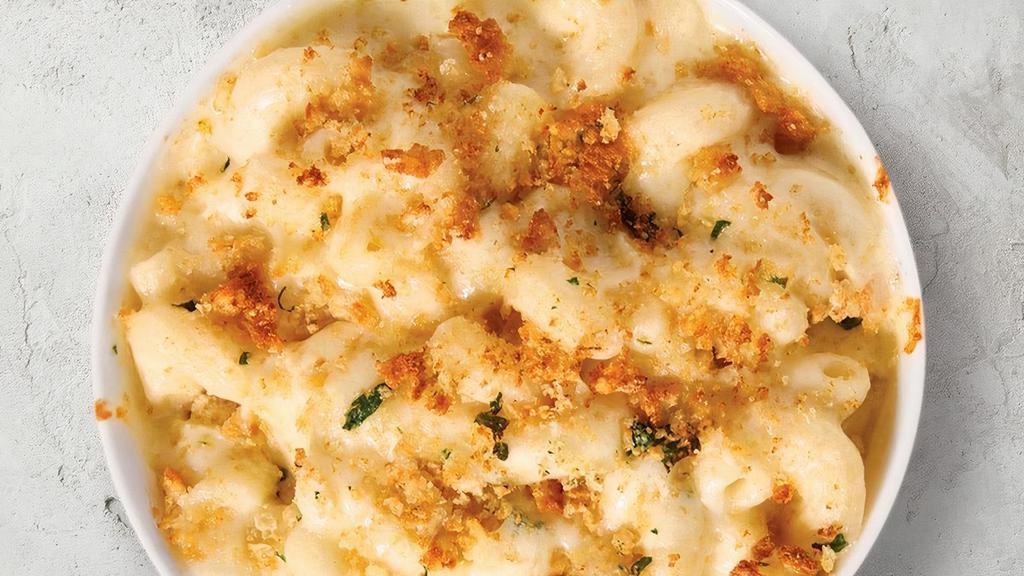 White Cheddar Mac & Cheese · Creamy mac & cheese made with white cheddar cheese topped with breadcrumbs..