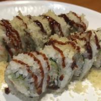 Crunch Roll · Shrimp tempura, imitation crab meat, cucumber and avocado. Topped with tempura flakes, smelt...