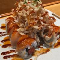 #24. Lady In Red Roll · Spicy tuna and cucumbers. Topped with spicy albacore, crunchy onions, spicy garlic ponzu and...