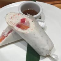 #35. Sushi Burrito · Tuna, salmon, yellowtail and crab meat wrapped with soy paper. Served with mustard sauce.