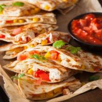 Chicken Quesadilla · Grilled chicken, cheese, onions, green chiles, and chipotle sauce folded into a warm tortill...