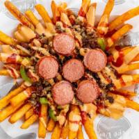 Asada Fries · Seasoned fries topped with carne asada, chorizo, grilled onion,  jalapeńos, ketchup, house s...