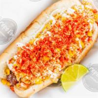 Elote Flamin Dog · Bacon wrapped Hot Dog topped with grilled onion, grilled corn, cotija cheese, sour cream, ch...