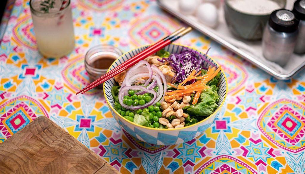 Chinese Chicken Salad · grilled chicken, red onion, wontons, peanuts, peas, red cabbage, carrots, sesame seeds, hoisin dressing (on the side)