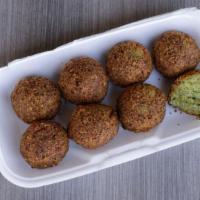 Falafel · Smashed chickpeas, fresh with fresh garlic, onions, parsley and spices, 8pcs.