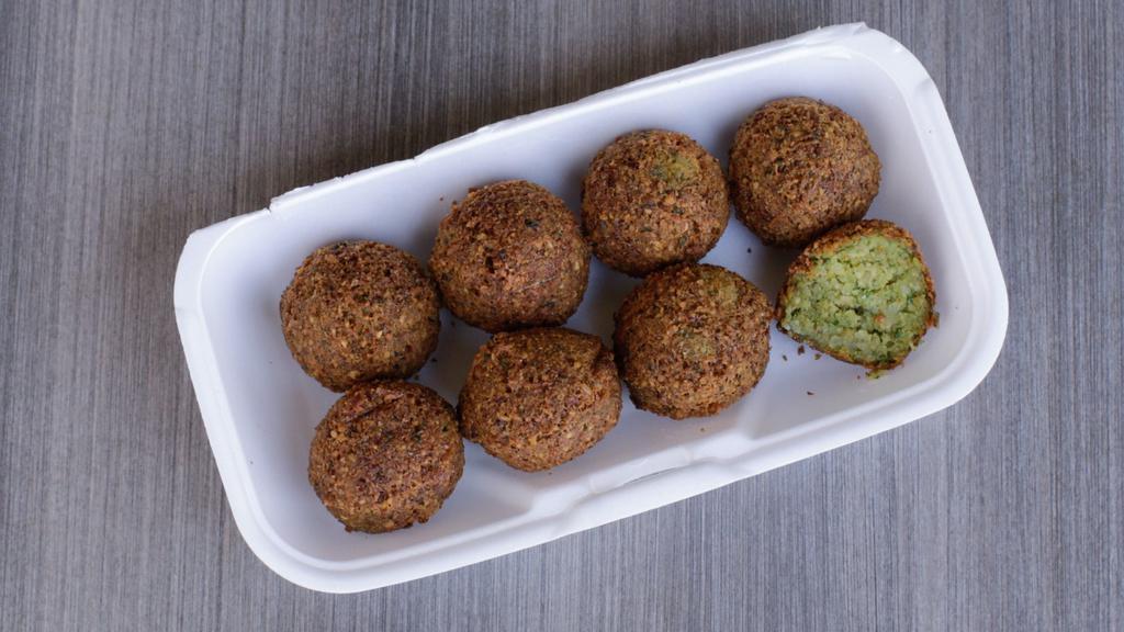 Falafel · Made Fresh in House, Mashed Slow Boiled Chickpeas Crushed, Mixed with Spices and Herbs, Balled And Deep Fried to Perfection.