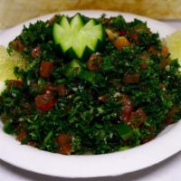 Tabouleh · Minced Parsley, Tomatoes, Cucumbers, Cracked Wheat, Mint, Lemon Juice, Onions, Olive Oil