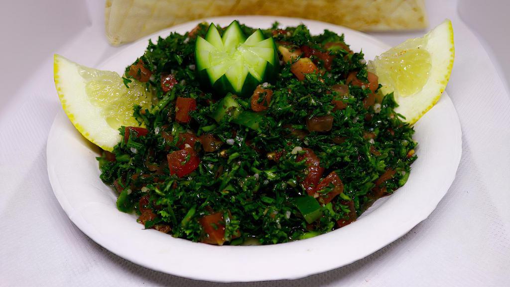 Tabouleh · Minced Parsley, Tomatoes, Cucumbers, Cracked Wheat, Mint, Lemon Juice, Onions, Olive Oil