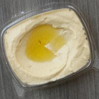 Hummus · Mashed chickpeas with tahini, lemon juice.