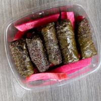 Grape Leaves (Dolmas) (5 Pcs) · Pickled Grape Leaves Stuffed With Rice and Vegetables Cooked and Served Cold Over a Bed of P...