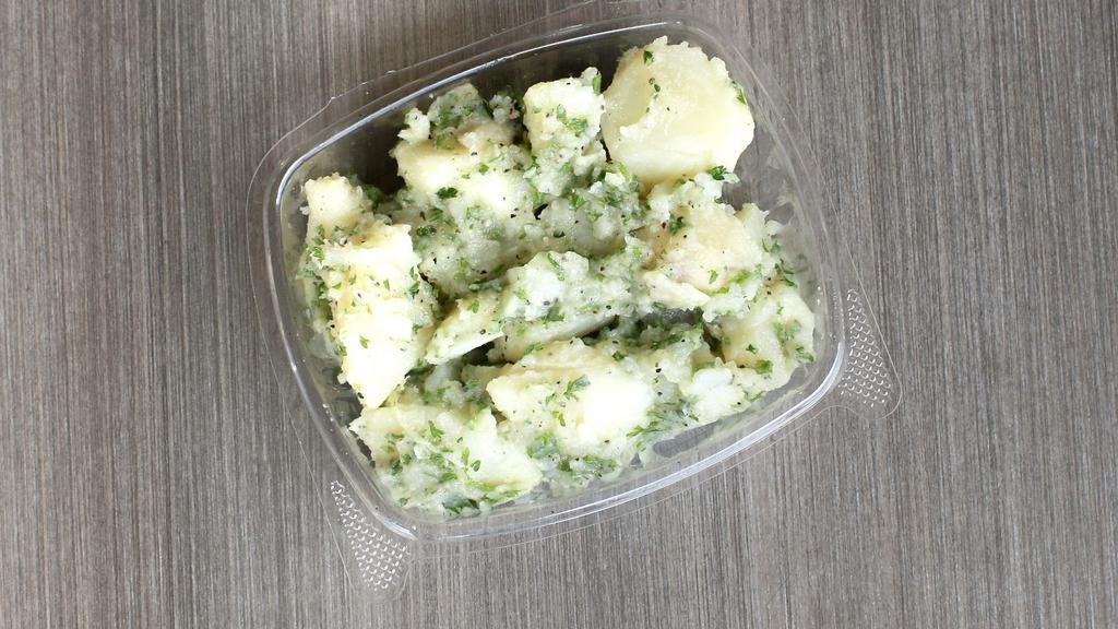 Potato Salad · Cooked Potatoes Tossed with Garlic, Lemon, Olive Oil and Parsley and Spices.