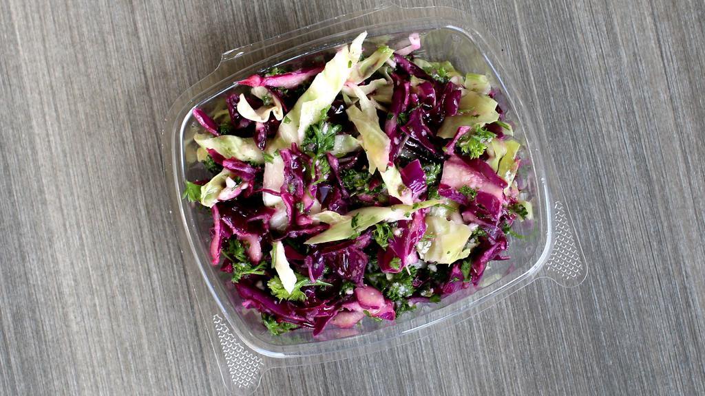 Red Cabbage Salad · Red Cabbage, Tossed with Fresh Lemon Juice, Spices and Olive Oil.