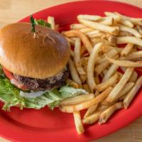 John'S Signature Burger · 100% Australian Wagyu beef on a brioche bun with onions, lettuce, tomato, and pickles.