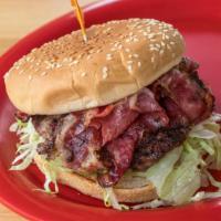 Colossal Burger · Pastrami, burger, house made Thousand Island.