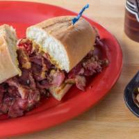 Pastrami Sandwich Combo · Piled on a roll.