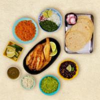Grilled Fish Taco Kit · 1 pound of protein, 12 hand-made tortillas, mexican rice, chopped onions, cilantro, shredded...