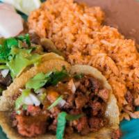 Taco Plate · 2 tacos with your favorite meat, with a side of rice and beans.