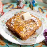 Golden Brown French Toast · brioche dipped in our french toast batter, griddled until golden brown. Served with syrup, b...
