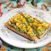 Pride Avocado Toast · mashed avocado mixed with organic chives, organic heirloom tomato, balsamic dressing on hous...