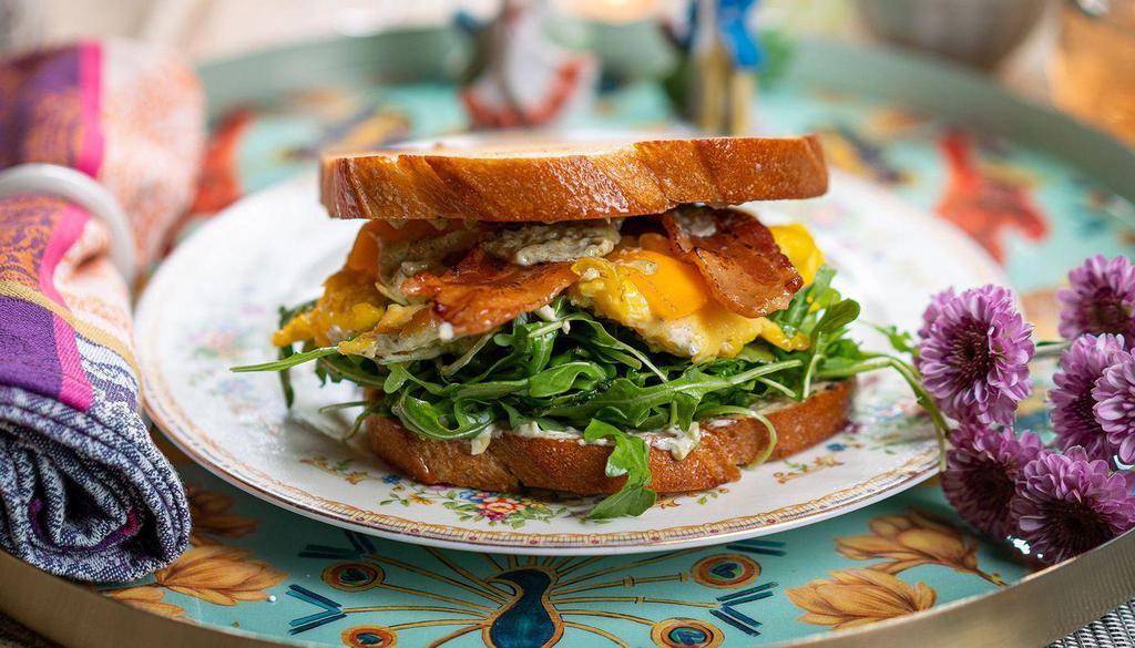 Bacon, Cheddar And Egg Sourdough Sandwich · sourdough, bacon, cheddar, egg, lemon herb aioli, arugula
