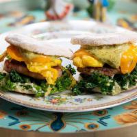 Two Sausage, Egg And Cheddar Muffins · 2 english muffins with egg, cheddar, sausage patty, kale, jalapeno lime aioli